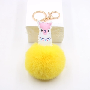 Porte-clés alpaga avec pompon jaune pour sacs avec mousqueton en métal doré élégant