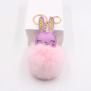 Cute purple leather bunny with pink fluffy pom pom keychain and gold metal clip
