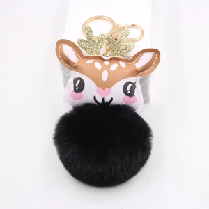 Cute Christmas reindeer plush keychain with black faux fur ball and gold glitter antlers