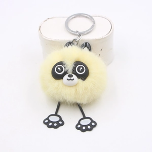 Porte-clés peluche raton laveur jaune mignon avec de longues jambes et visage de panda