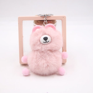 Fluffy pink bear plush keychain with soft faux fur and durable metal ring for bags