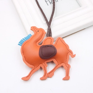 Orange camel PU leather charm with heart saddle and blue tassel for bags and keys