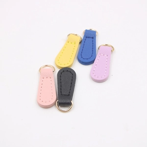 Five colorful PU leather zipper pulls with gold D-rings for DIY crafts and accessories