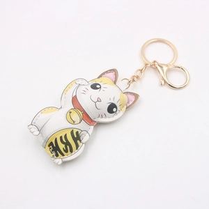 Cartoon Maneki Neko leather keychain with lucky cat charm and gold metal carabiner