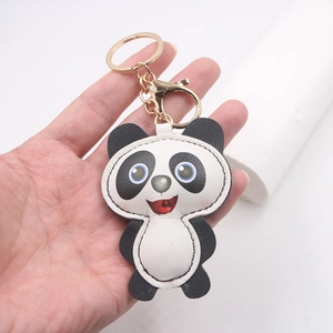 Cute panda PU leather keychain with gold metal ring and lobster clasp on white background
