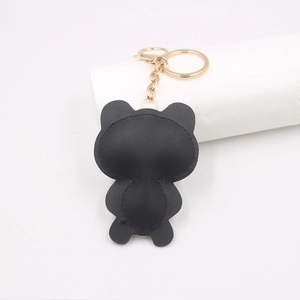 Cute black PU leather panda keychain charm with gold hardware for bags and car keys
