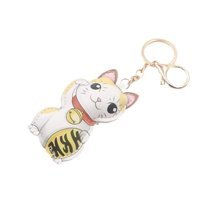 Maneki Neko leather keychain with gold bell and ring on a white background