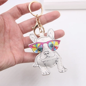 Cute white leather bulldog keychain with rainbow sunglasses and gold metal hardware
