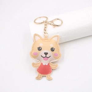 Porte-clés Shiba Inu de Dessin Animé Mignon en Cuir PU Chien en Robe Rouge Pendentif de Sac Avec Fermoir Mousqueton Doré