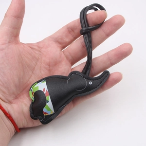 Dark leather elephant charm for backpack featuring colorful geometric patterns and lanyard