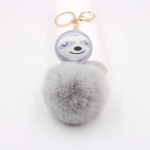 Pendentif paresseux mignon avec pompon en fourrure grise et porte-clés doré pour sacs