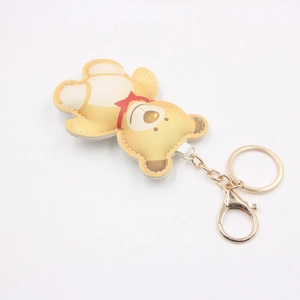 Cute yellow PU leather bear keychain with red bowtie and golden metal clasp