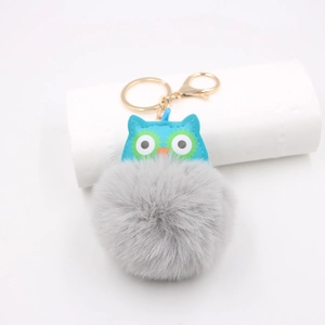 Porte-clés chouette en peluche avec tête en cuir bleu et fermoir mousqueton doré