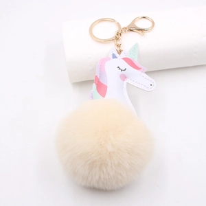 Unicorn plush faux fur keychain with colorful mane and golden ring for bags