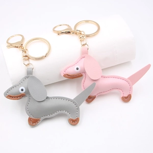 Dachshund dog PU leather keychain pendant with lychee pattern and gold metal lobster clasp