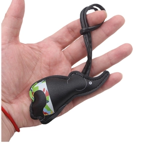Handmade leather elephant bag charm with colorful geometric pattern and lanyard