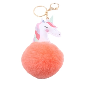 Unicorn keychain with white faux leather head and fluffy pink pompom on golden ring