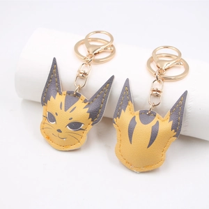 Pair of cute orange and purple leather cat keychains with gold metal rings for bags