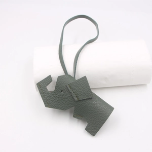 Litchi texture greyish-green PU leather elephant bag charm with matching lanyard