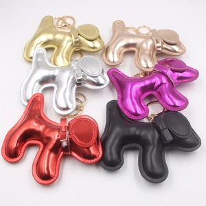 Puppy shaped colorful faux leather keychains with metallic finish and gold hardware