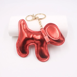 Metallic red leather dog bag charm with golden lobster clasp and keychain ring accessory
