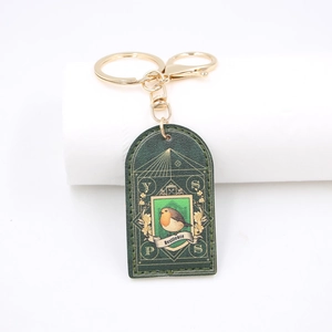 Faux leather keychain with robin bird design and Resilience text on gold ring