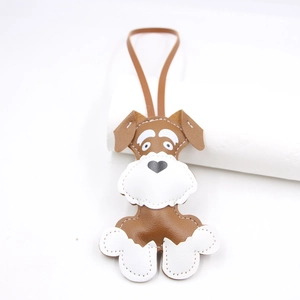 Cute brown and white leather Schnauzer dog charm with lanyard for bags and backpacks