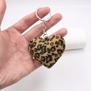 Plush leopard print heart-shaped keychain with silver metal ring for bags and accessories