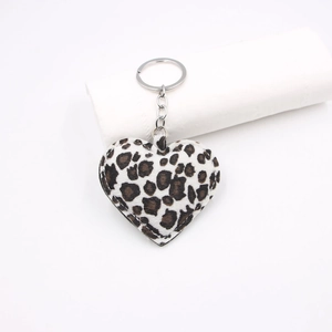 Plush heart keychain with leopard print pattern and silver metal ring for bags