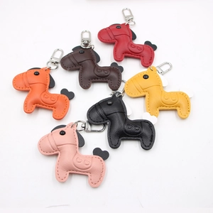 Exquisite leather pony charms in multiple colors with neat stitching and metal hardware