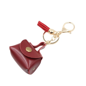 Mini portamonete in pelle rossa con portachiavi dorato e nappa per borse