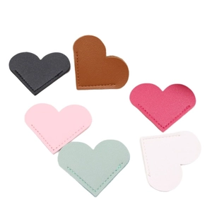 Set of six heart-shaped PU leather corner bookmarks in black, pink, green, and white