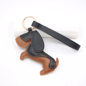 Dachshund leather bag charm keychain with gold ring and black wristlet strap