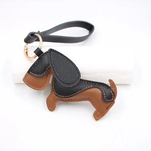 Dachshund PU leather keychain with stitch details and rose gold metal ring accessory