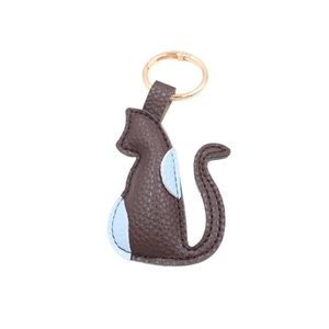 Cute brown cat shaped PU leather keychain with blue accents and golden metal spring hook