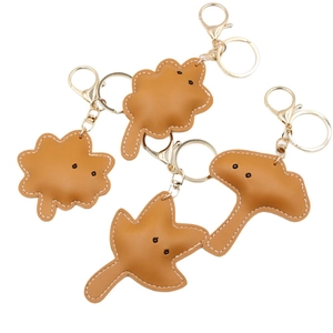 Autumn-themed PU leather leaf keychains with golden metal lobster clasps and stitching