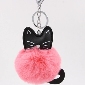 Pink fluffy cat keychain with black PU leather head and silver swivel clasp on white background