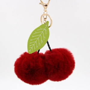 Porte-clés cerise en peluche avec pompons rouges, feuille verte et fermoir doré