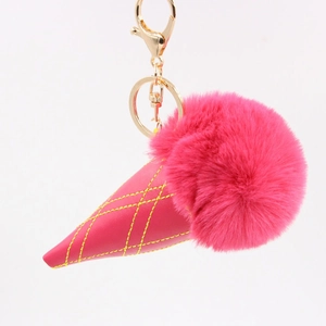 Detail of rose red faux fur ice cream keychain with pink leather waffle cone and gold clasp