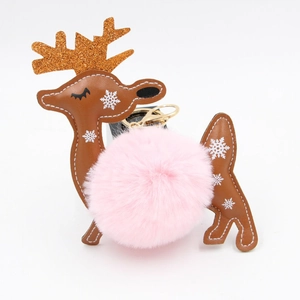 Christmas reindeer keychain with pink faux fur pompom and golden glitter antlers charm