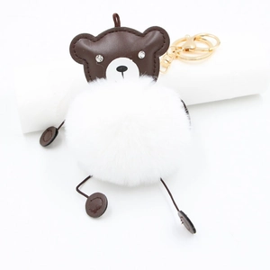 Cute brown PU leather bear faux fur keychain with a fluffy white ball for handbags