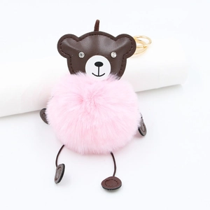 Cute brown PU leather bear keychain with a large pink fluffy faux fur pompom and gold ring