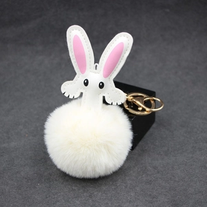 Cute white bunny plush ball keychain with long ears and gold metal clasp accessory