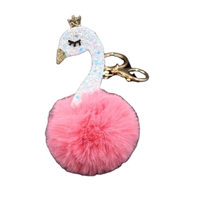 Pink swan pom-pom keychain with golden crown and glittering sequins for bags