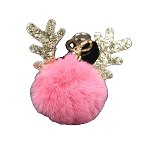 Pink reindeer faux fur pompom keychain with golden sequined antlers for bags and cars