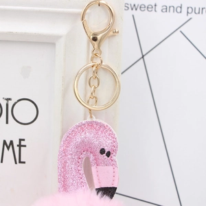 Pink sequin flamingo keychain with fluffy faux fur pompom and golden alloy clasp