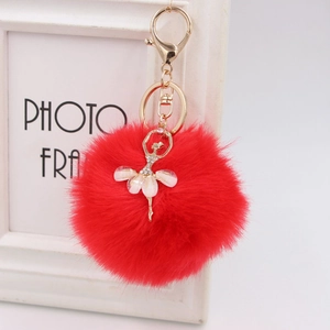 Red faux fur pompom keychain with gold ballerina dancer pendant for car bags