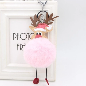 Detail of pink fluffy reindeer keychain with reindeer antlers and silver metal clasp