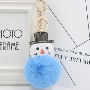 Porte-clés bonhomme de neige en peluche avec pompon bleu ciel et attache dorée
