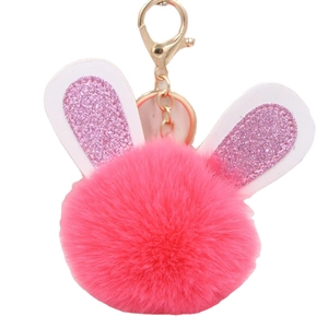 Pink plush bunny ear keychain with glitter details and golden spring ring clip for handbags